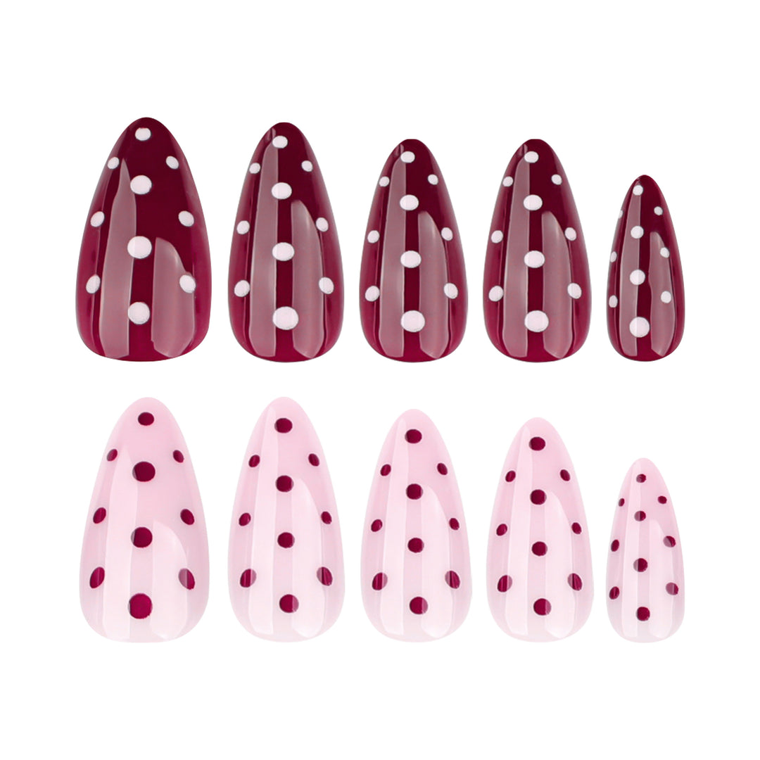 Artful Nail Extensions with Dots and Elegant Accents Stornfield