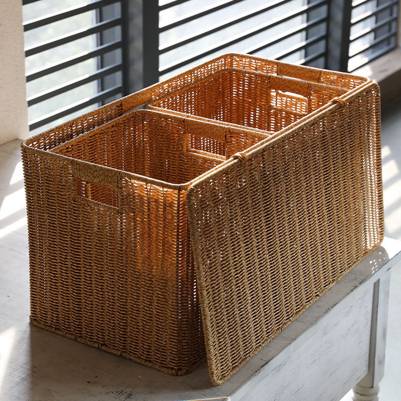 Unisex storage basket made of natural material with practical handles Stornfield