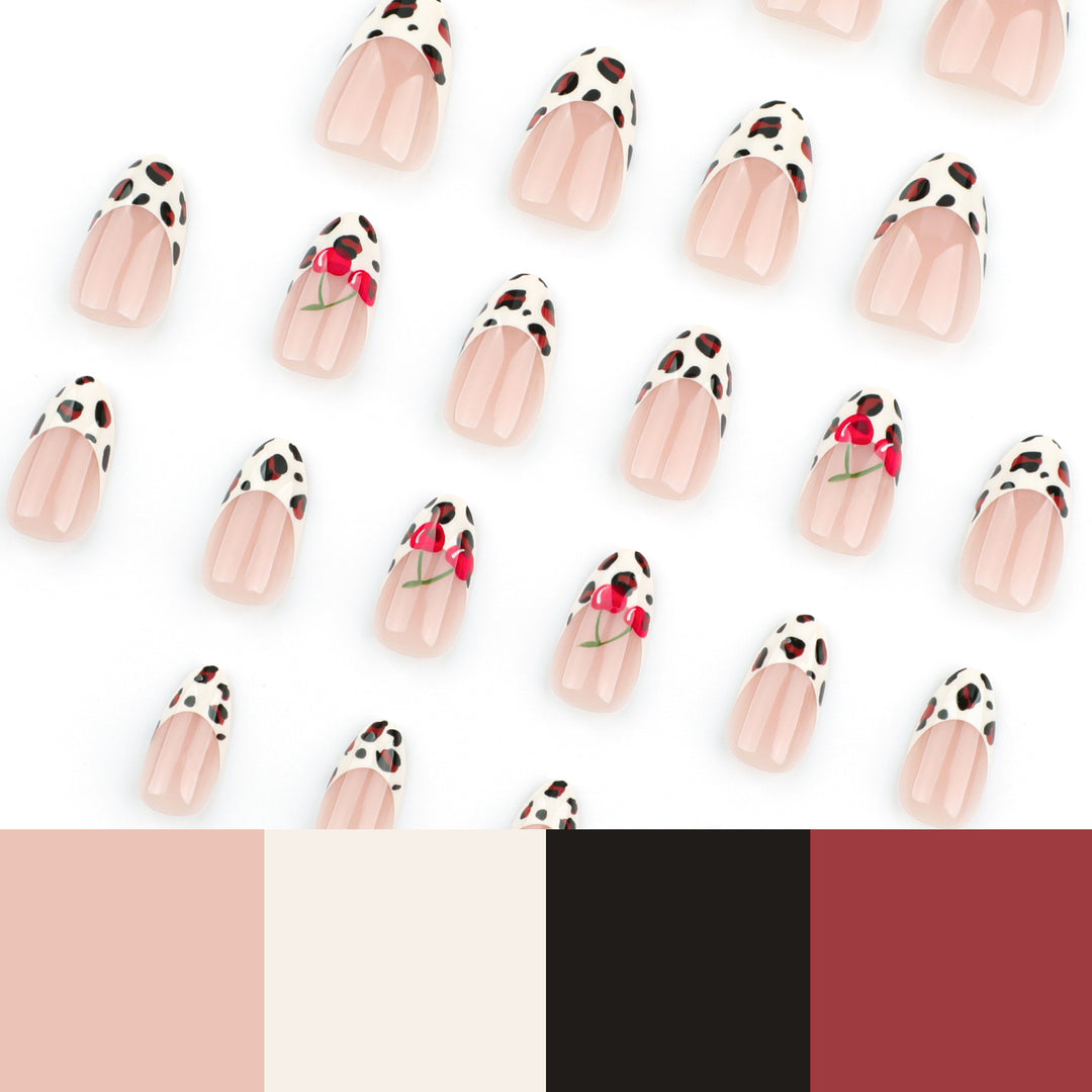 Artful animal pattern nails with cherry accents Stornfield