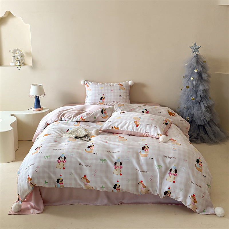 Children's bedding set with pompom corners and playful animal and heart print