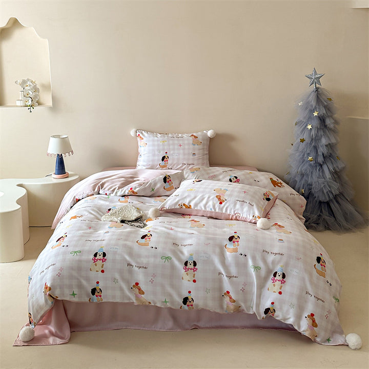Children's bedding set with pompom corners and playful animal and heart print