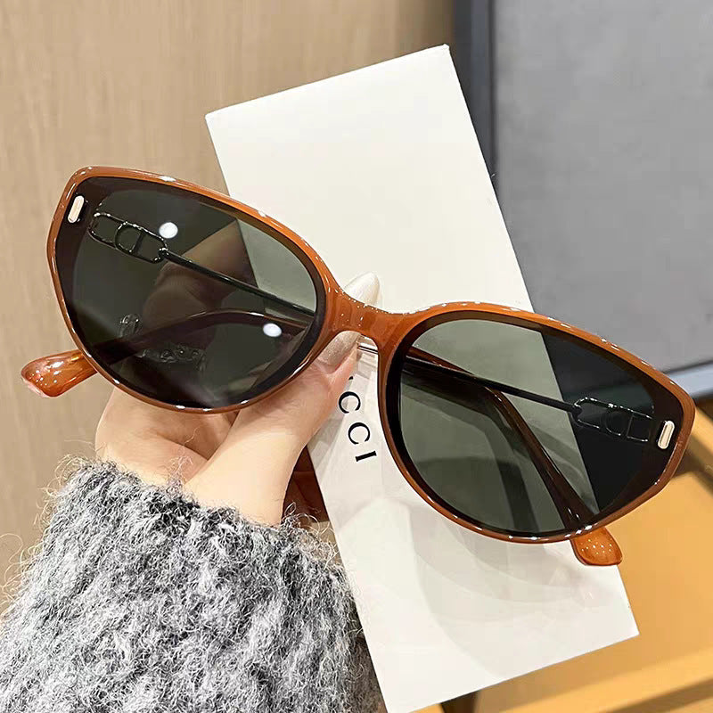 Women's designer sunglasses with delicate metal frame and extraordinary cat-eye design Stornfield