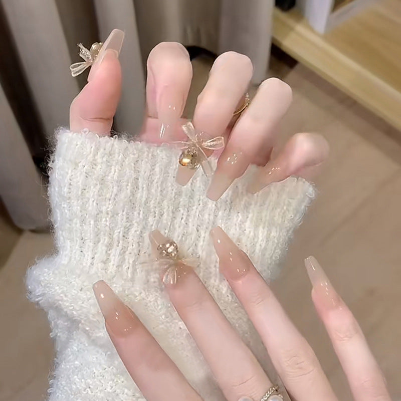 Artificial nail set with elegant 3D patterns and delicate accents Stornfield