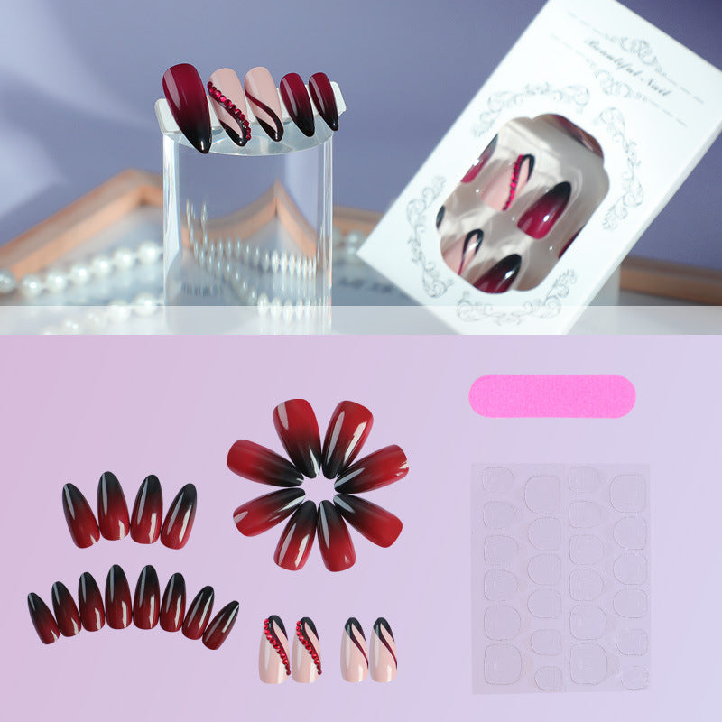 Nail set with elegant ombre design and creative decorations Stornfield