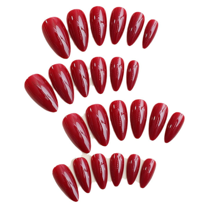 Artificial nail set with elegant stiletto tips and matte finish Stornfield