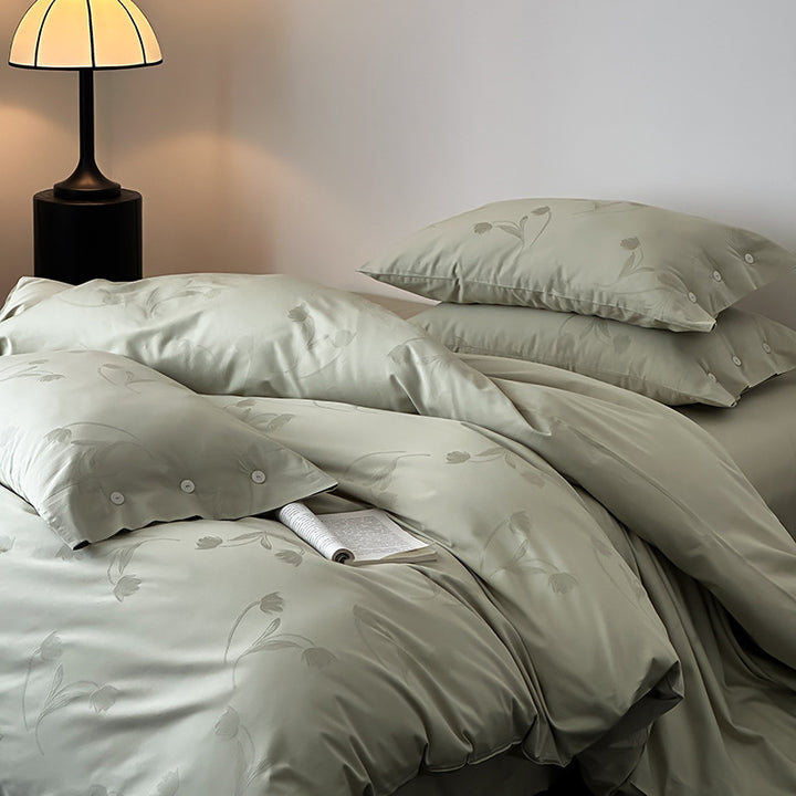 Premium duvet cover set made of cotton satin with tonal floral jacquard and button closure