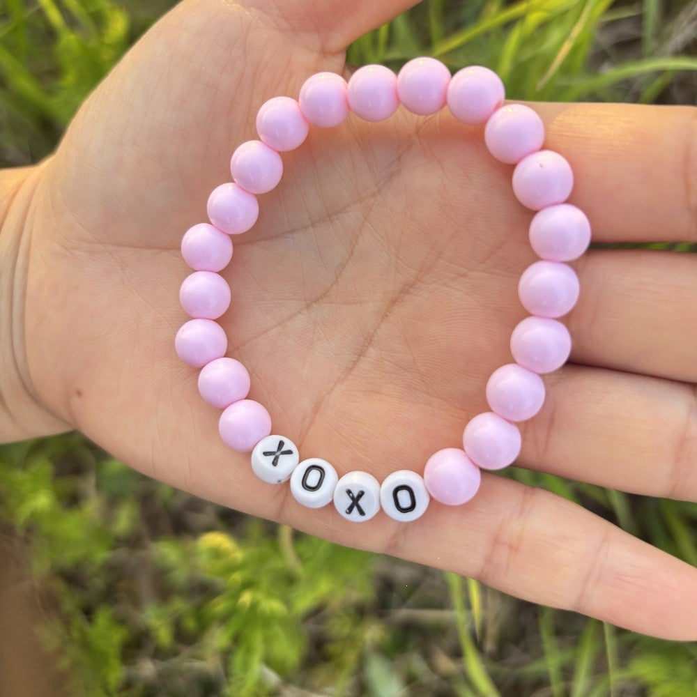 Friendship bracelet made of pastel beads Stornfield