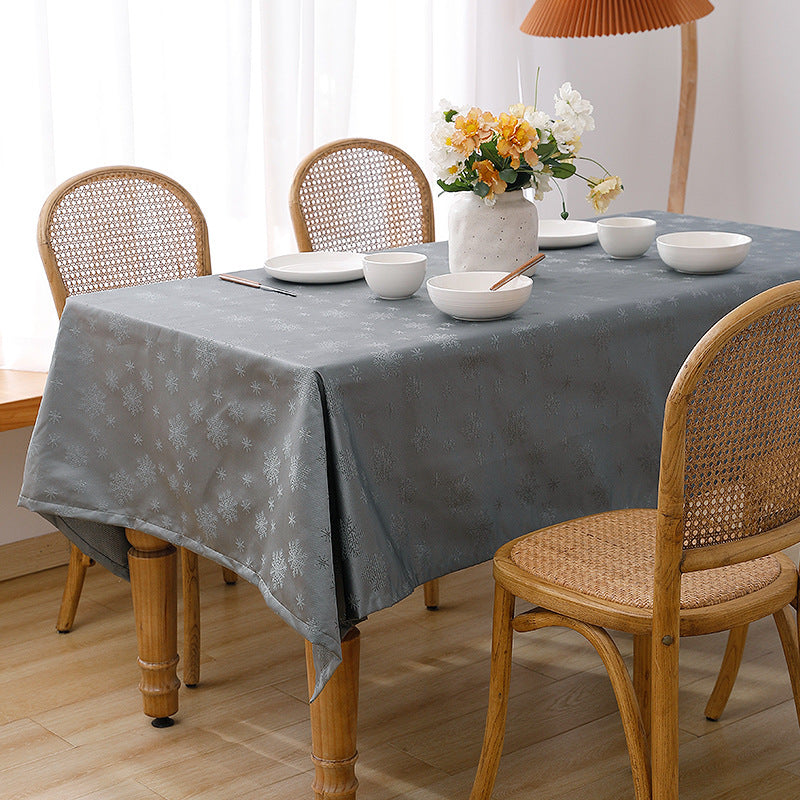 Rectangular premium table linen made of jacquard polyester with subtle frost floral embossing Stornfield