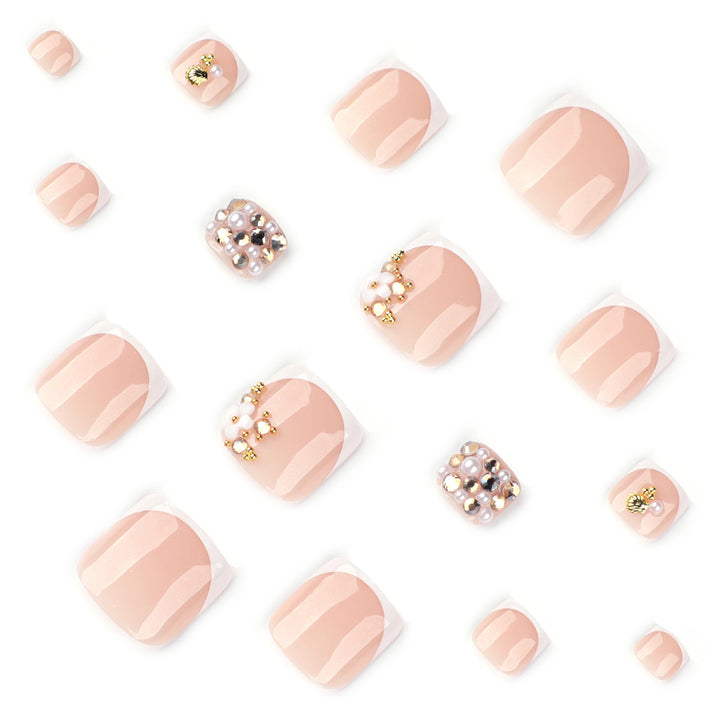 Glamorous toenail art with luxurious rhinestone and floral designs Stornfield