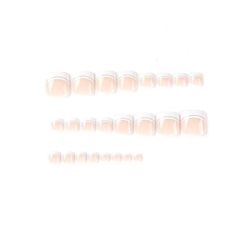 Artful toenail art with elegant French tip design Stornfield