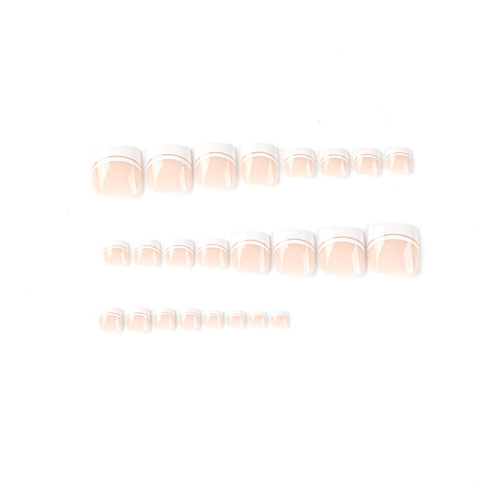 Artful toenail art with elegant French tip design Stornfield