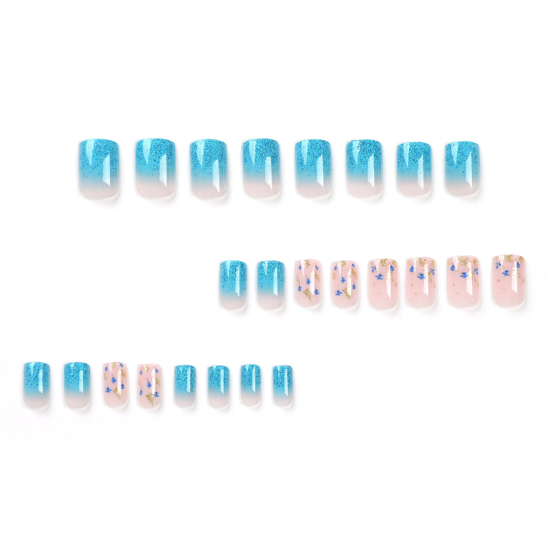 Artful acrylic nails with floral design and glitter effects Stornfield