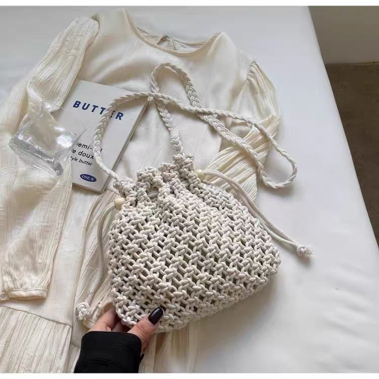 Hand-knotted shoulder bag with floral details Stornfield
