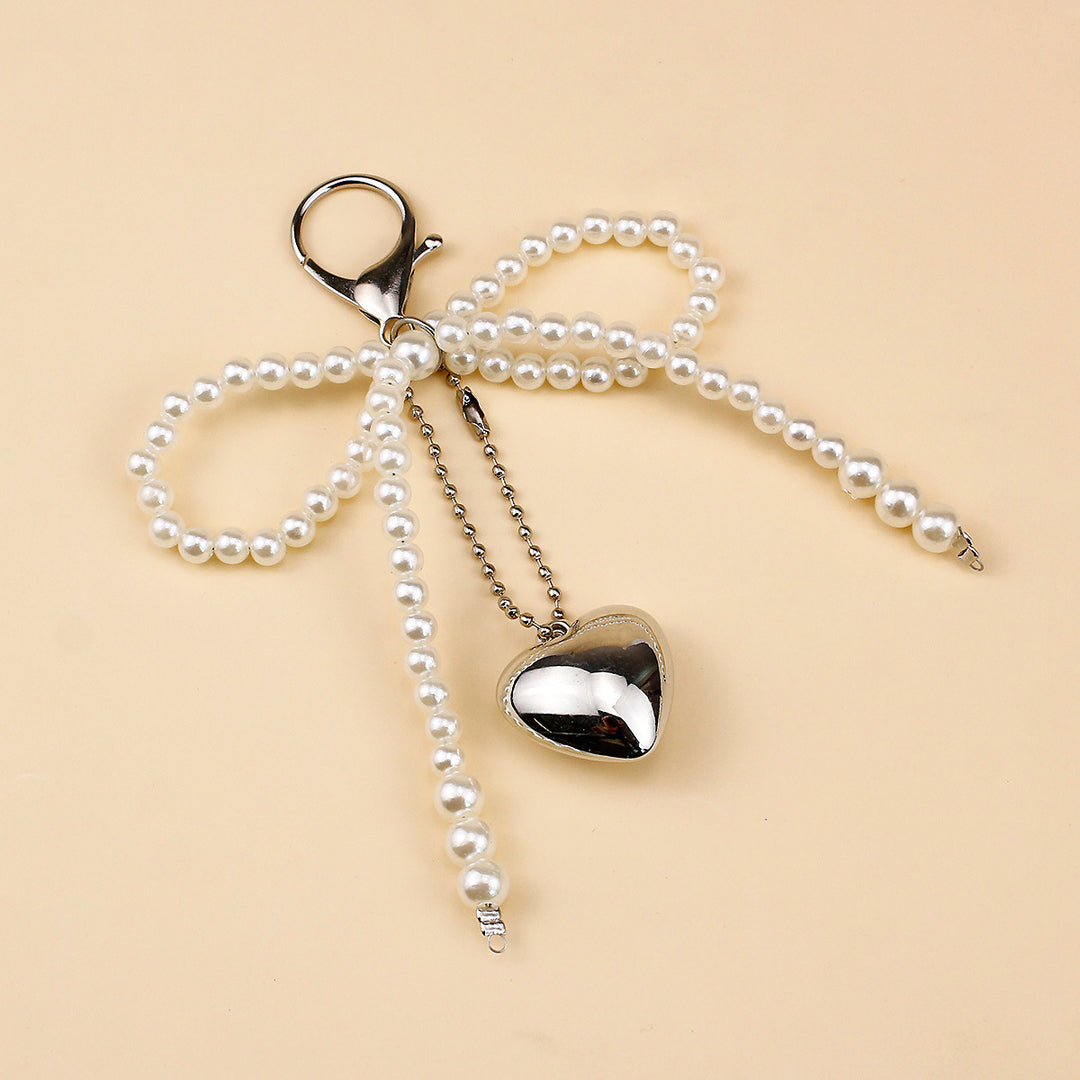 Elegant Pearl Bow Brooch Stornfield