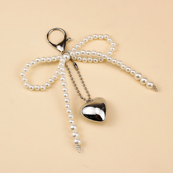 Elegant Pearl Bow Brooch Stornfield