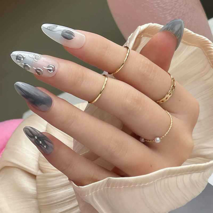 Artistic Stiletto Press-On Nail Design with Contemporary Accents Stornfield