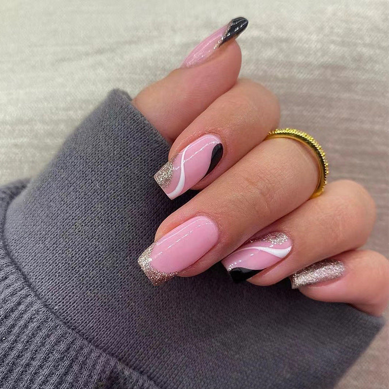 Trendy Nail Art with Glitter and Wave Accents Stornfield
