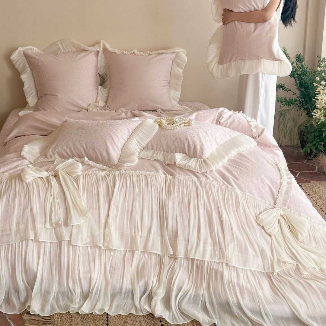 Elegant pleated bed set with gathered bed skirt and decorative pillows