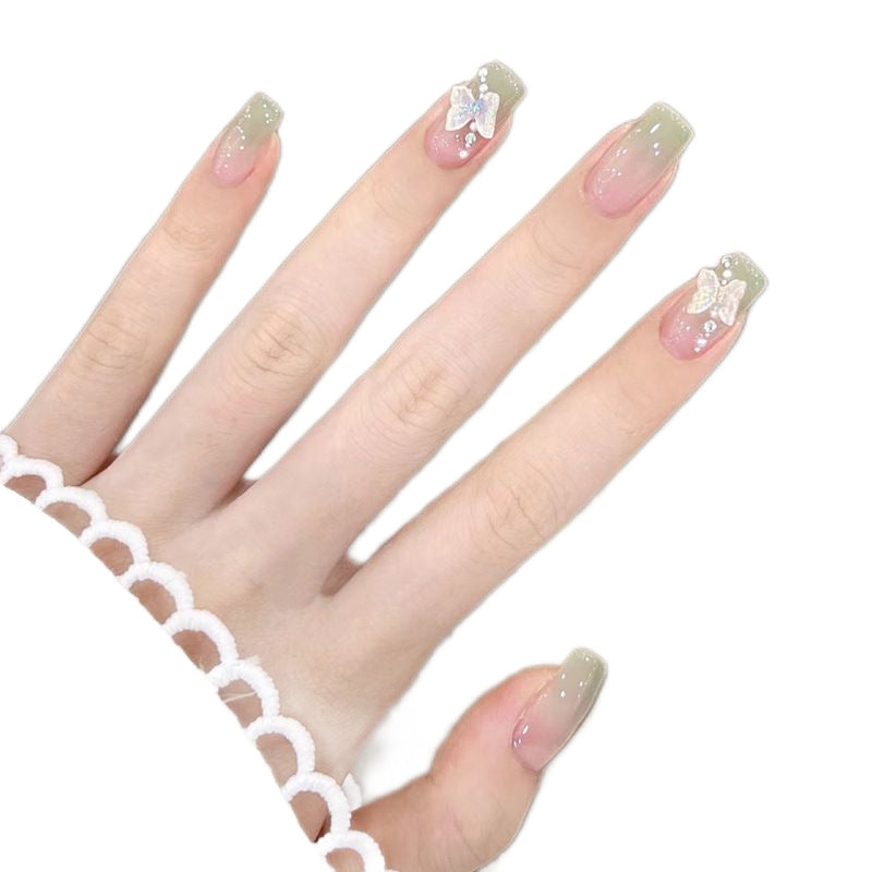 Artificial artificial nails with elegant ombre design and jewelry accents Stornfield