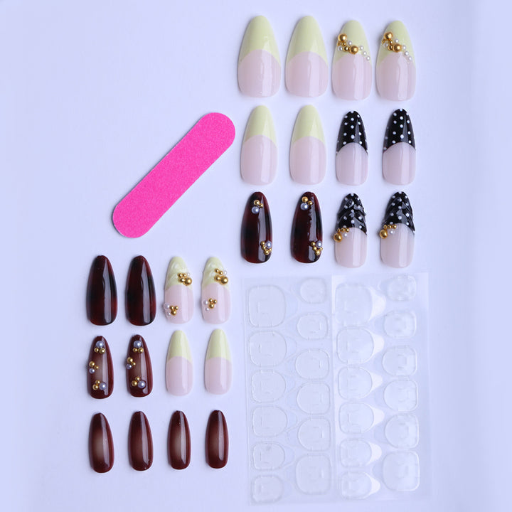 Artistic fingernails with gold applications Stornfield