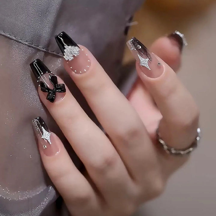 Acrylic nail set with glamorous 3D decorations and noble accents Stornfield