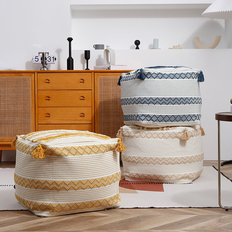 Square Boho seat pouf made of woven cotton blend with tassels and removable cover Stornfield