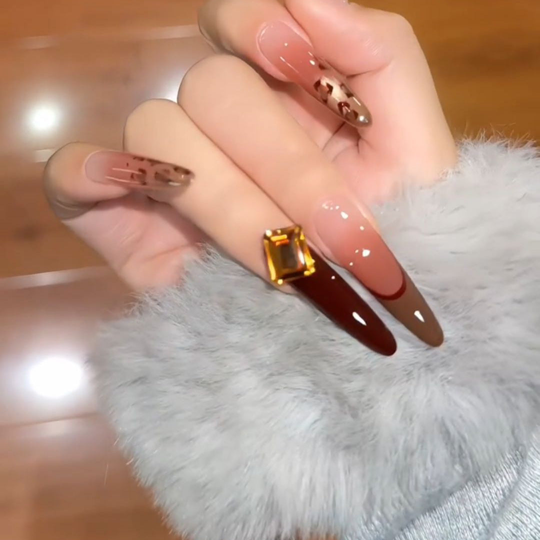 Artificial nails with elegant glitter and gold accent design Stornfield