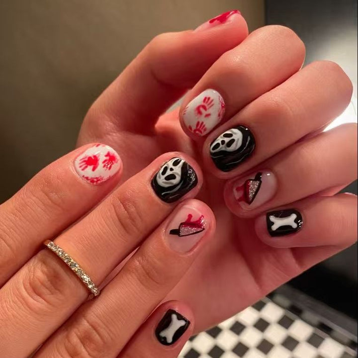 Creative Halloween Nail Art Set with Creepy Designs and Sparkling Accents Stornfield