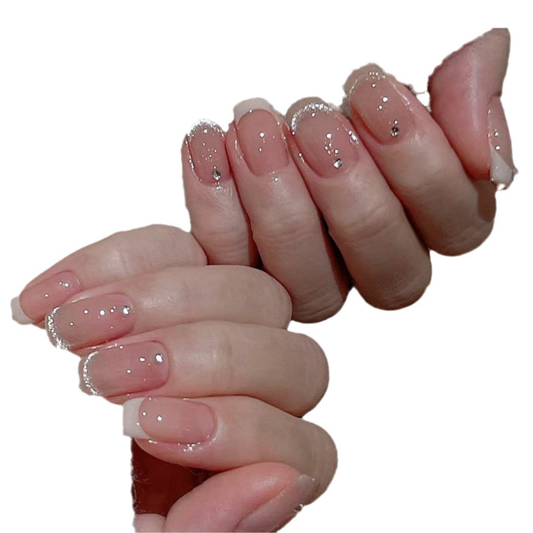 Glamorous artificial nails with filigree rhinestone details Stornfield
