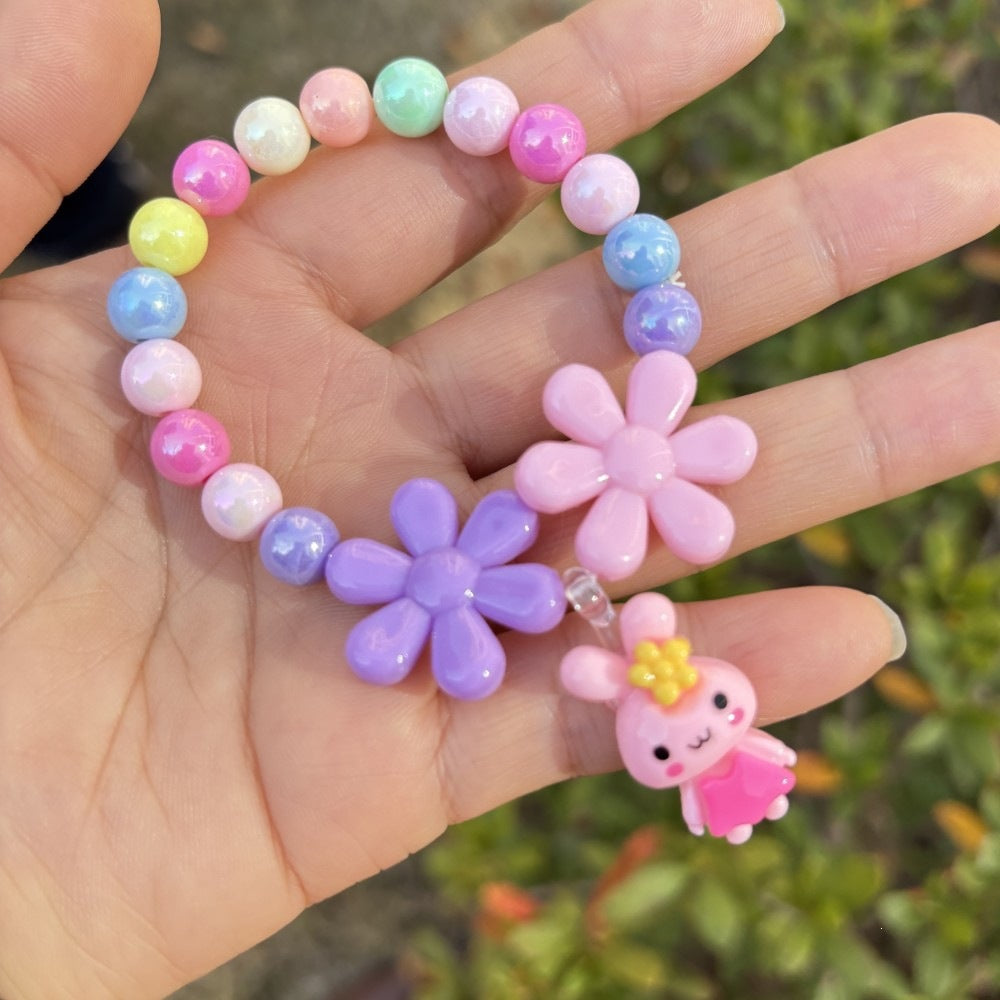 Colorful bracelet with flower charms Stornfield