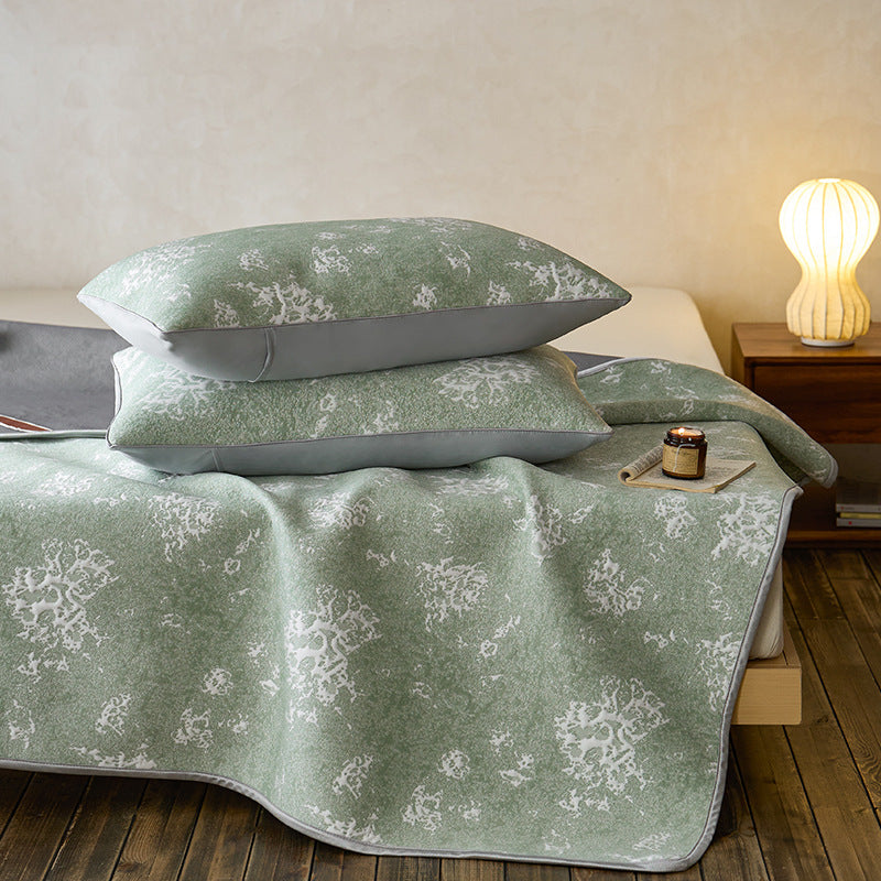 Quilted microfiber mattress pad with non-slip bottom and floral jacquard surface