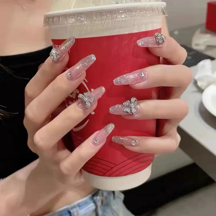 Glamorous artificial nails with sparkling accents Stornfield