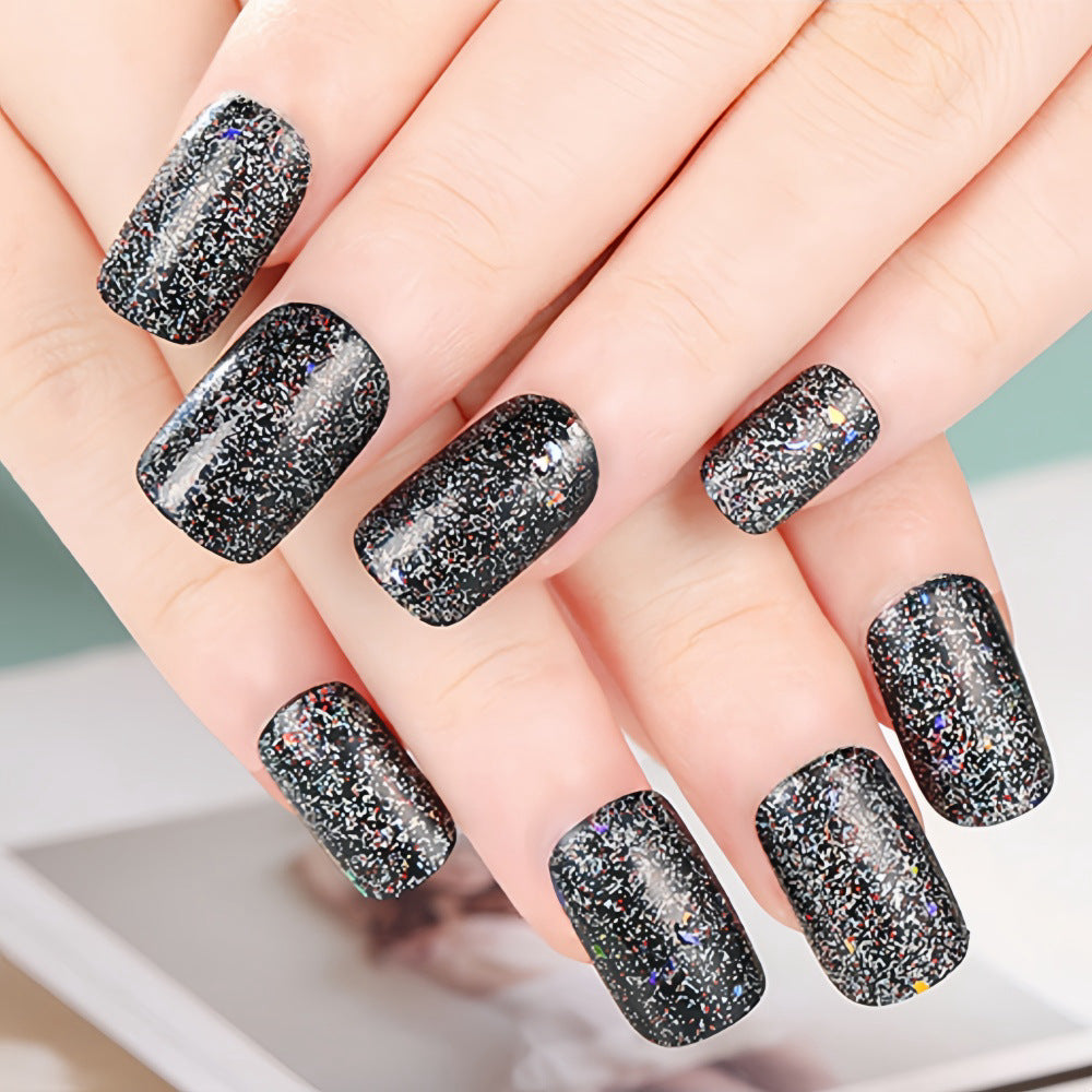Shiny artificial nails with sparkling glitter Stornfield