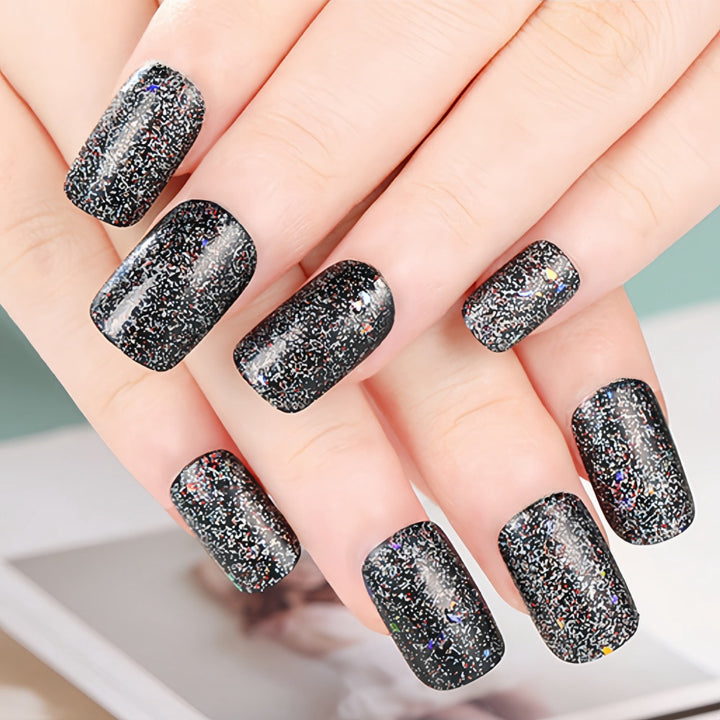 Shiny artificial nails with sparkling glitter Stornfield