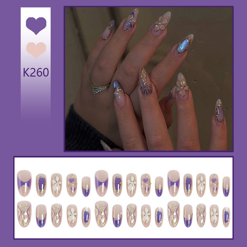 Elegant artificial nails with floral design and color accents Stornfield