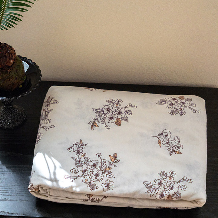Organic Cotton Muslin Swaddle Blanket with Playful Cartoon Print