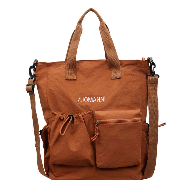 Tote bag with multifunctional outer pockets and adjustable shoulder strap Stornfield
