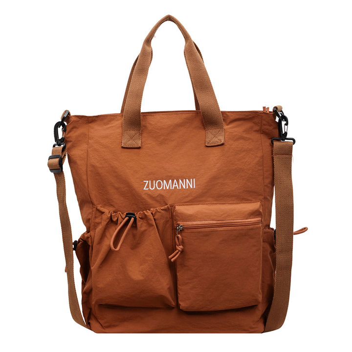 Tote bag with multifunctional outer pockets and adjustable shoulder strap Stornfield