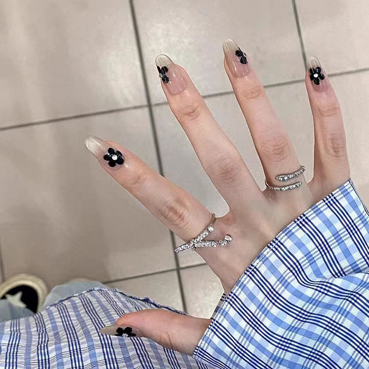 Artificial nails with elegant floral decorations Stornfield