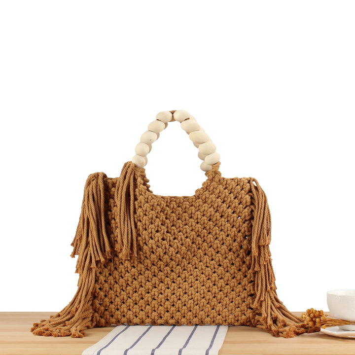 Creative crochet handbag with decorative fringes Stornfield