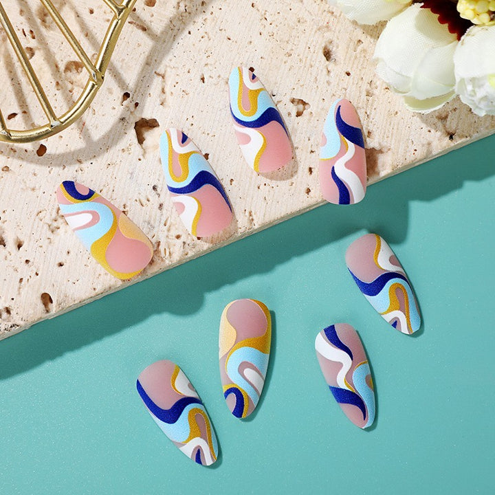 Artificial nails with modern wave-shaped design Stornfield