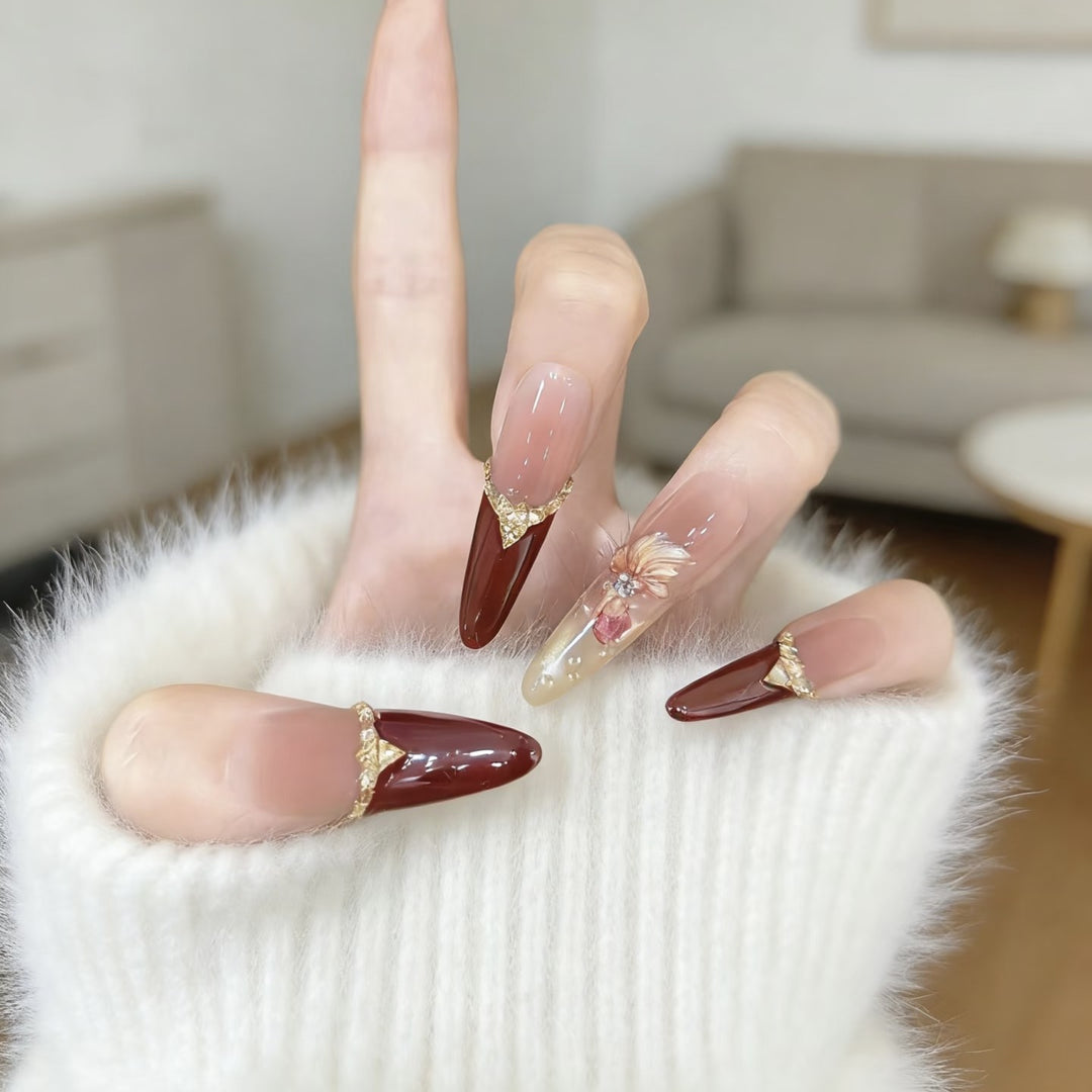 Elegant Stiletto Nail Art Extensions with Decorative Accents