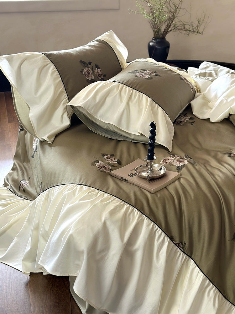 Luxurious satin bedding set with floral embroidery and frills
