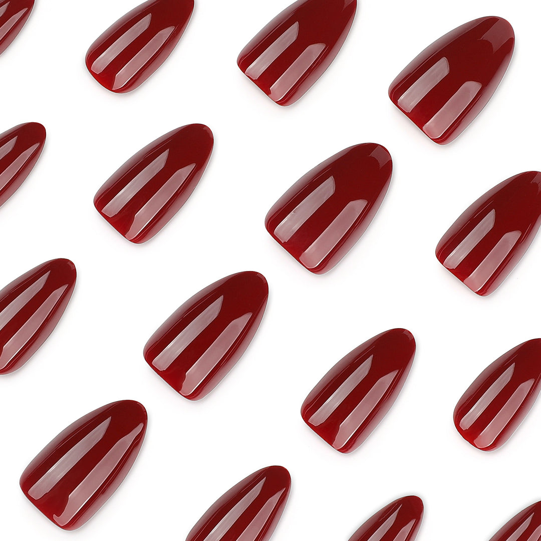 Glamorous stiletto nails with high gloss and elegant design accents Stornfield