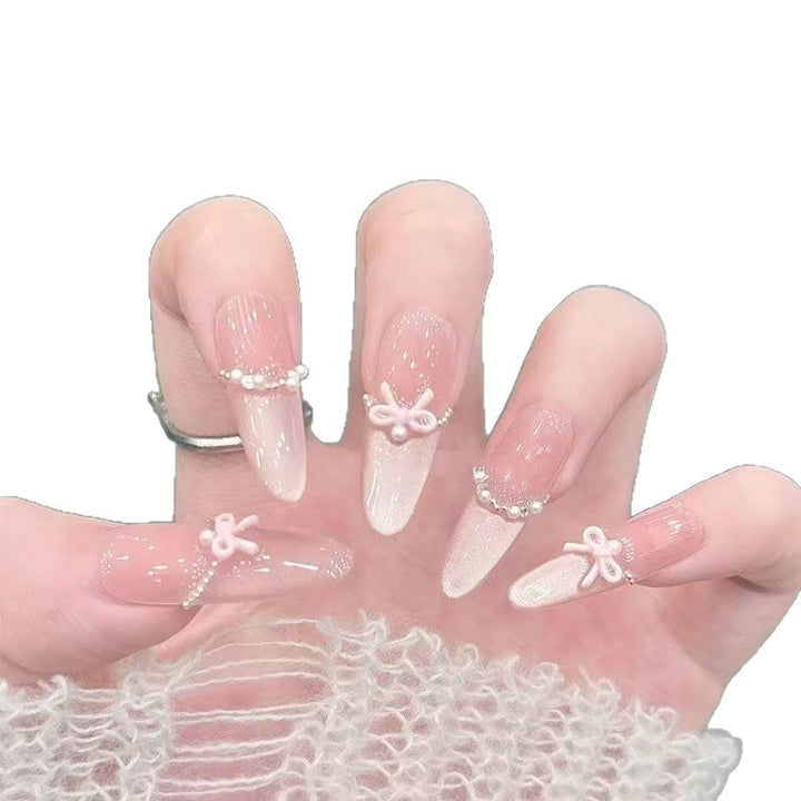 Elegant Stiletto Nail Art Tips with Pearl Accents