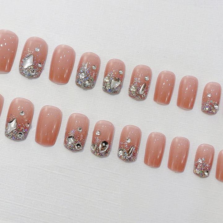Artificial nails with elegant rhinestone accents Stornfield