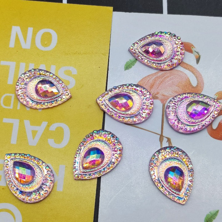 Glittering drop appliqués Stornfield