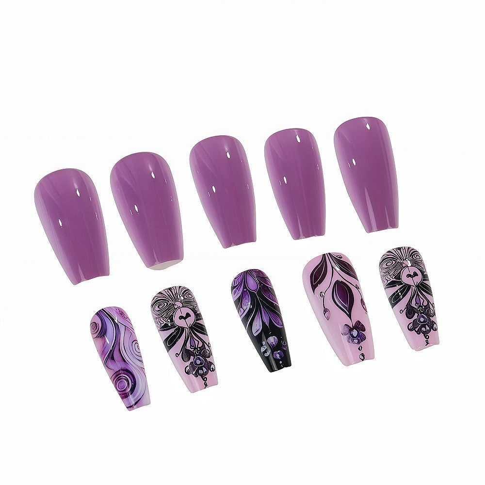Artificial nails with intricate purple pattern Stornfield