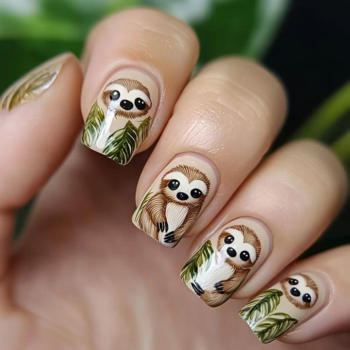 Art nails with cute sloth and leaf design Stornfield