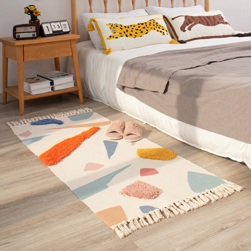 Woven runner rug with abstract relief applications and fringes Stornfield